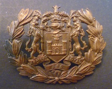 Wigan Corporation Tramways brass cap badge