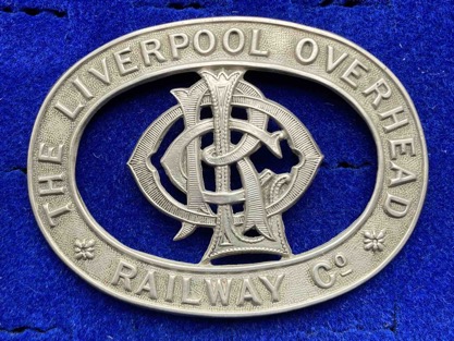 Waterloo and Great Crosby Tramways cap badge, Liverpool Overhead Railway cap badge