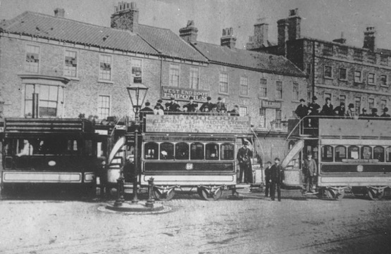 Stockton and Darlington Steam Tramways engine and trailers outside the Grey Horse Inn