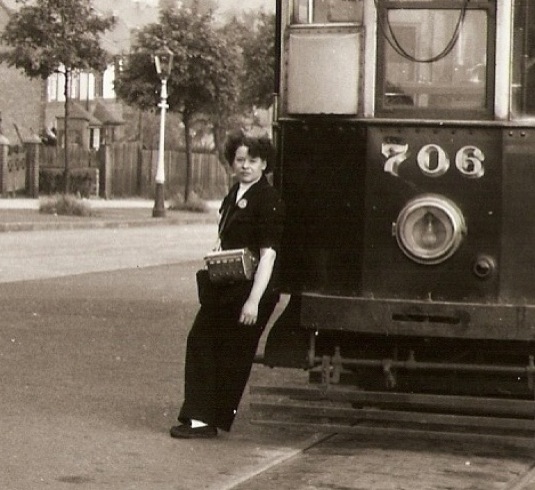 Birmingham Corporation Tramways conductress with Tramcar No 706